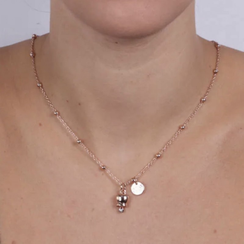 BYS - Collana in metallo con campanella portafortuna rosata pendente
